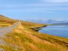 Iceland. Landscape in fjord Seydisfjordur with church Eyri during autumn. Art Print